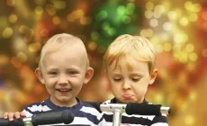 happy boy and unhappy boy at Christmas