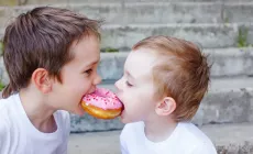 Boy not sharing cookies with toy bear – Teaching kids to share