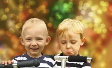 Happy boy, sad boy on scooter – Handling kids’ present expectations at Christmas