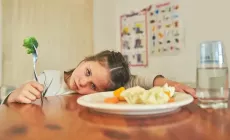 girl_refusing_to_eat_vegetables_smaller_-_iStock-599487124.webp